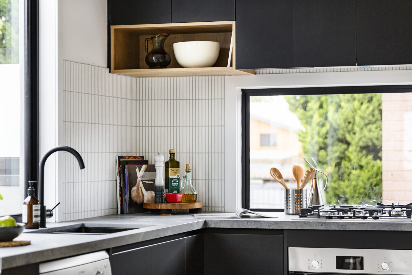Kitchen benchtop with cooktop and storage